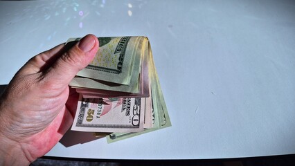 American or US dollars in form of a bunch of fifty and twenty dollar bills - money in the USA