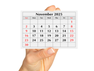 Page of the annual monthly calendar november 2025 in hand. Isolated on transparent png