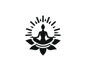 Silhouette of woman meditating on a lotus flower