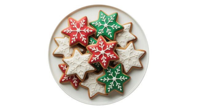 Christmas overhead shot of star shaped christmas cookies on a white plate isolated on transparent background red, green, and white iced cookies