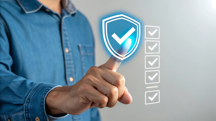 Person touching a digital shield with a checkmark indicating security and protection