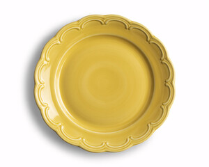 Elegant yellow plate with scalloped edges, perfect for showcasing culinary creations on a bright white backdrop