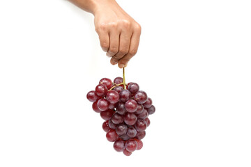 Hand hanging bunch of grapes on a white background. Fruit Photography.