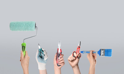 People holding different tools in hands against grey background, closeup. Collage