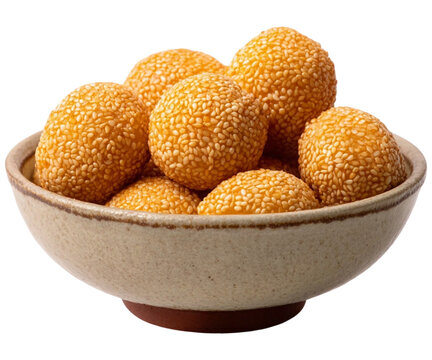 Golden sesame kuih buah rotan snacks close up in rustic bowl delicious sweet treat