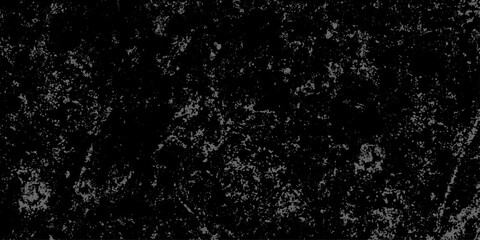 Black and white grunge cracked earth desert texture. a rough, old cracked concrete wall surface with a grunge distressed background texture. old damage and dirty overlay texture with grunge effect.