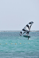 kitesurfer surfing on Atlantic ocean in Corralejo, Fuerteventura, Canary islands, Spain