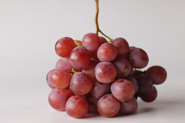 Fresh Red table grapes, likely Red Globe, Crimson Seedless, or Flame Seedless