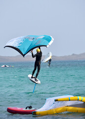 kitesurfer surfing on Atlantic ocean in Corralejo, Fuerteventura, Canary islands, Spain