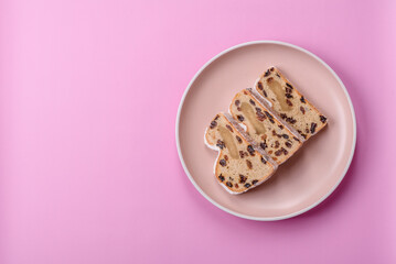 Stollen, a German Christmas pastry for the winter holidays. Stollen as a food background
