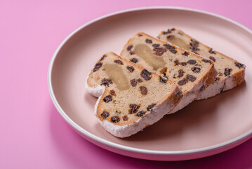 Stollen, a German Christmas pastry for the winter holidays. Stollen as a food background