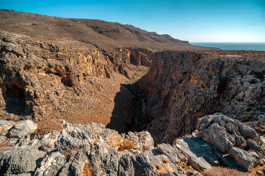 View into deep rocky canyon of Zakros Gorge also known as Valley of the Dead, Crete, Greece