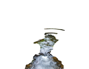 Cascading water flows through a rocky channel, blurring in motion against a dark background