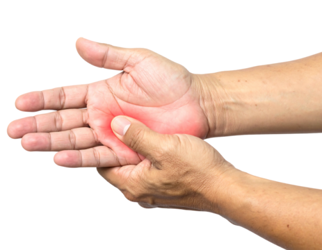 Close up of human hands, one pressing on the other, with a reddish mark on the palm indicating pain