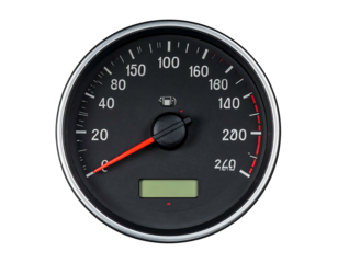 Close up of speedometer with a red needle pointing left, against a black background, modern digital display at the bottom