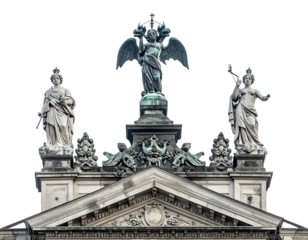 Architectural detail showcasing rooftop statues of angelic figures atop a building