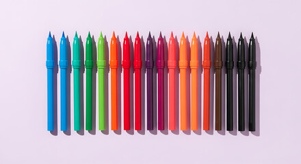 Vibrant Spectrum: A Row of Colorful Marker Pens on a Light Purple Background, Ready for Creativity and Art