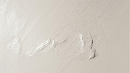 Peeling paint on a wall, revealing layers underneath.