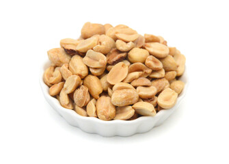 Dried peanuts in closeup on white