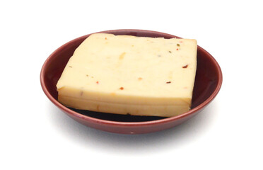 Piece of cheese isolated on a white background