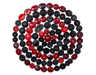 Circle pattern made of red and black buttons on a black background, creating a concentric spiral