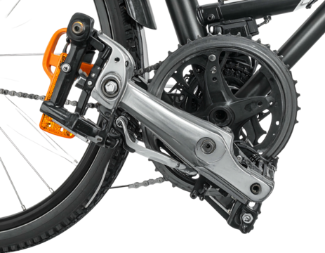 Close-up of bicycle's crankset, chain, and pedal. Silver metal gleams against the tire and frame's dark hue