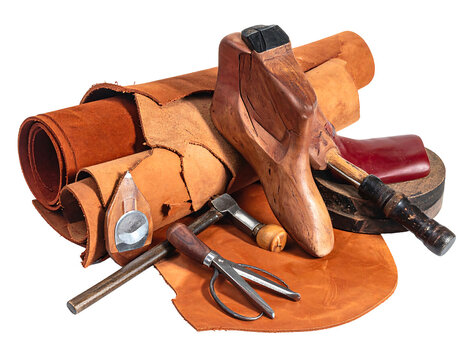Artisan's leatherworking tools & raw hide, a craftsman's still life, detail showing textures & tones - Powered by Adobe