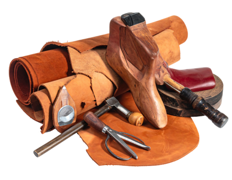Artisan's leatherworking tools & raw hide, a craftsman's still life, detail showing textures & tones