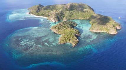 The beautiful island of Pulau Tellang, lies east of Alor, Indonesia. This area in the Banda Sea is known for its diverse coral reefs and spectacular scuba diving and snorkeling.