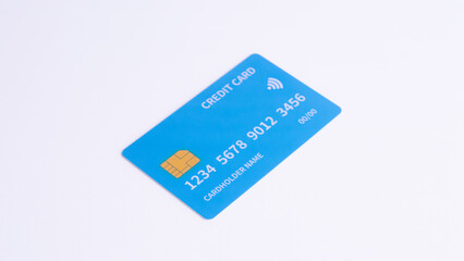 Blue Fictional Credit Card on White. Concept of secure online payment, finance, digital banking, and contactless transaction.
