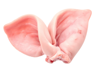Close-up of two raw, pale pink pig ears stacked and slightly overlapping, isolated against a stark black background
