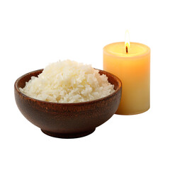 Bowl of cooked rice next to a burning candle isolated on transparent background, offering a simple and serene composition