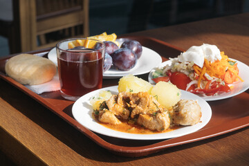Hearty Breakfast Tray with Meat, Potatoes and Salad