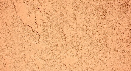 Stunning texture with vibrant orange stucco finish perfect for modern design projects and creative backgrounds