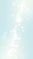 bright winter blue blurred bokeh lights and glitter stars ,space shiny glowing bokeh light new year and christmas,vertical social media background	