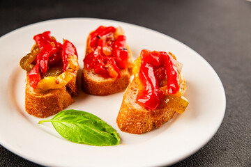 Bruschetta roasted pepper vegetable dish natural product tasty snack fresh delicious gourmet food background on the table rustic top view copy space vegan and vegan food