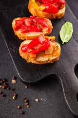 Bruschetta roasted pepper vegetable dish natural product tasty snack fresh delicious gourmet food background on the table rustic top view copy space vegan and vegan food