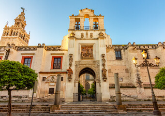 Obraz premium Puerta del Perdon gate and Giralda tower of Seville cathedral, Spain