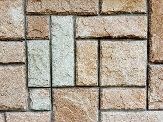 Stone baseboard covering.