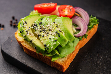 Avocado toast vegetable dish natural product tasty snack fresh delicious gourmet food background on the table rustic top view copy space keto and paleo diet vegan and vegan food