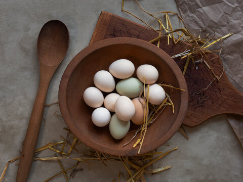 Fresh Backyard Bantam Chicken Eggs on Rustic Background