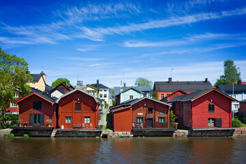 Fototapeta premium View of red warehouses in Porvoo from the river side, Finland
