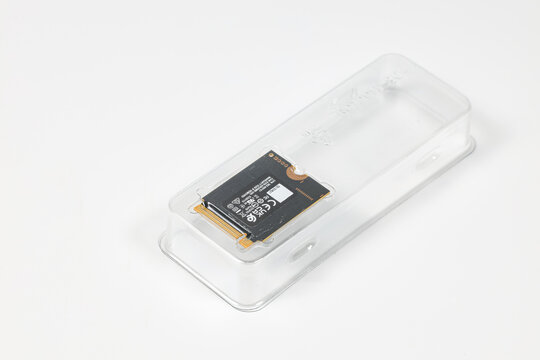 NVME PCIe solid-state drive M.2 2230 form factor in PETE package isolated on white background.