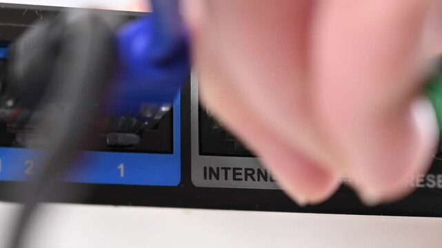 The internet cable is plugged into the router. 
