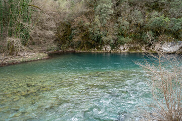 Aerial view of voidomatis river with the clear waters and the famous bridge in epirus Greece
