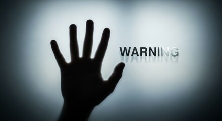 Fototapeta premium Concept of caution and danger with outstretched hand and warning text