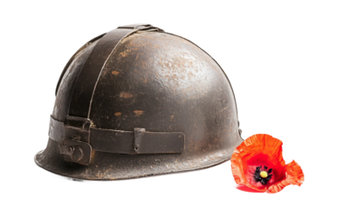 Historical WWII helmet with symbolic poppy flower for memorial and war commemoration isolated on transparent background PNG