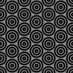 Repeated small and big black circles background. Seamless surface pattern design with circular ornament. Hoops wallpaper. Round motif. Spheres image. Digital paper with rings. Vintage style vector art