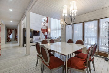 Bright and spacious dining area in a modern home with elegant decor and ample natural light