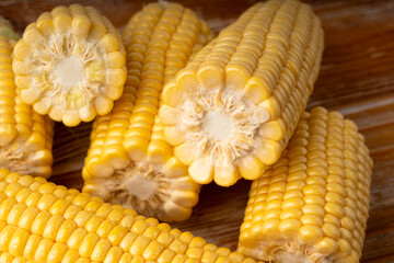 Sweet corn ears closeup. Fresh maize cob macro texture, autumn sweetcorn, corncob close up